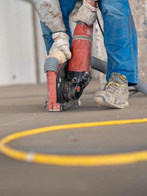 crop-site-worker-using-concrete-cutter-2025-01-08-11-45-09-utc